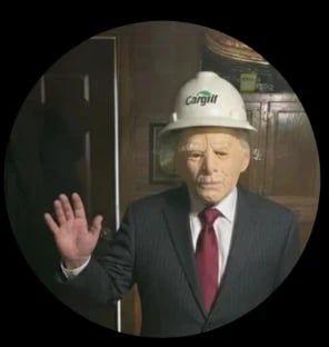 Customer wearing a character mask with a suit and hard hat