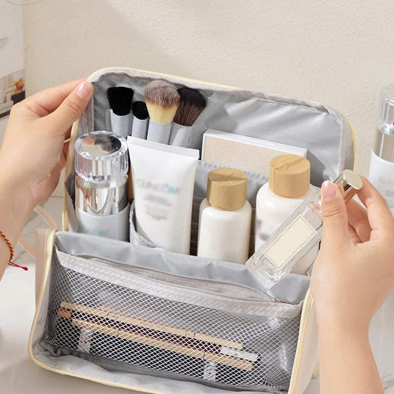 Partitioned cosmetic bag with organized storage for makeup and skincare