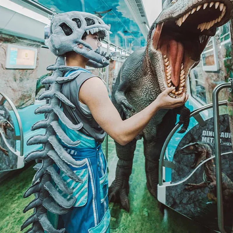 Dinosaur skeleton costume shown at a Halloween event