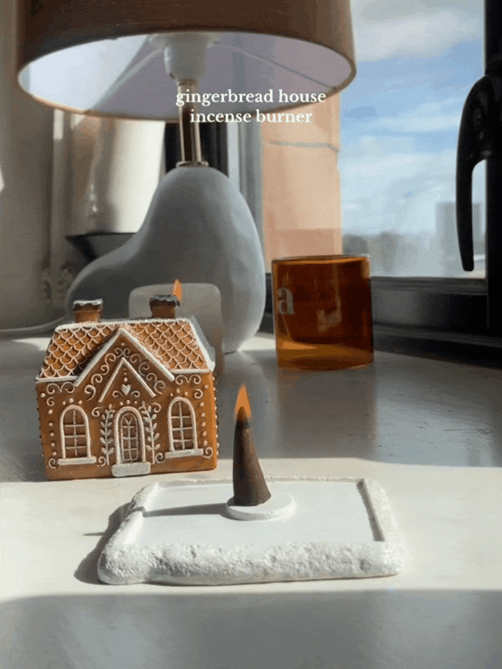 Gingerbread house incense cone burner with chimney smoke