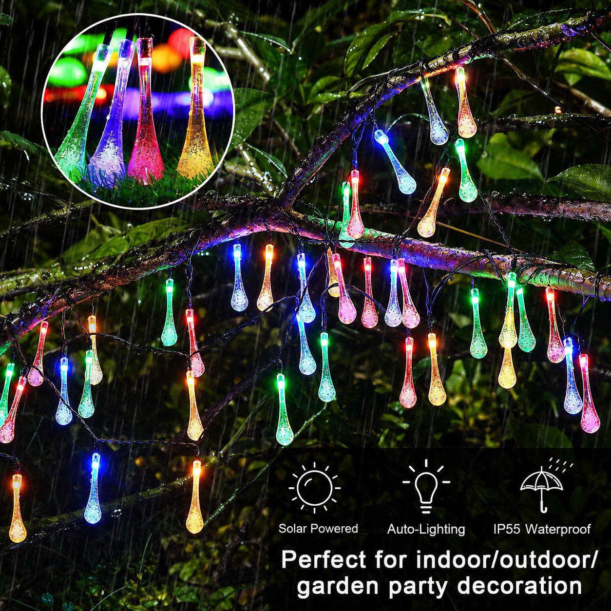 Multicolor solar teardrop lights glowing outdoors in wet weather