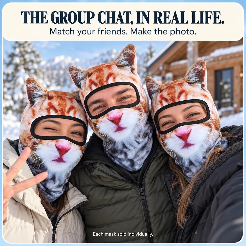 Three friends posing together in matching orange cat masks