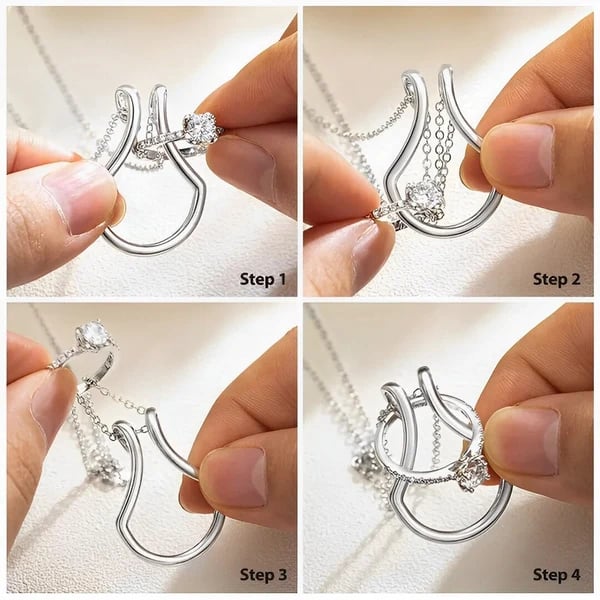 Close detail of the polished metal ring holder pendant