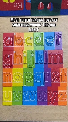Child using a MarbleTracers letter tray