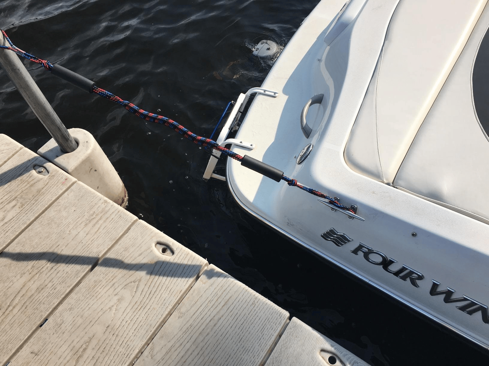 Customer boat secured with a bungee dock line