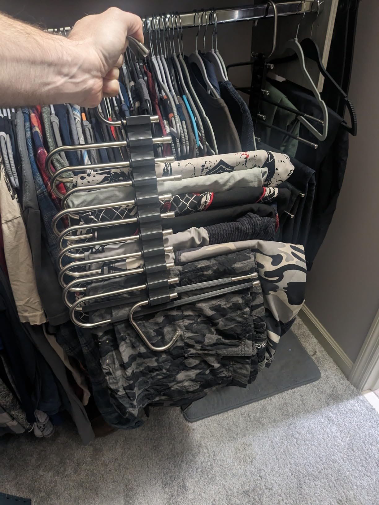 Convenient storage of infrequently used slacks Convenient storage of infrequently used slacks