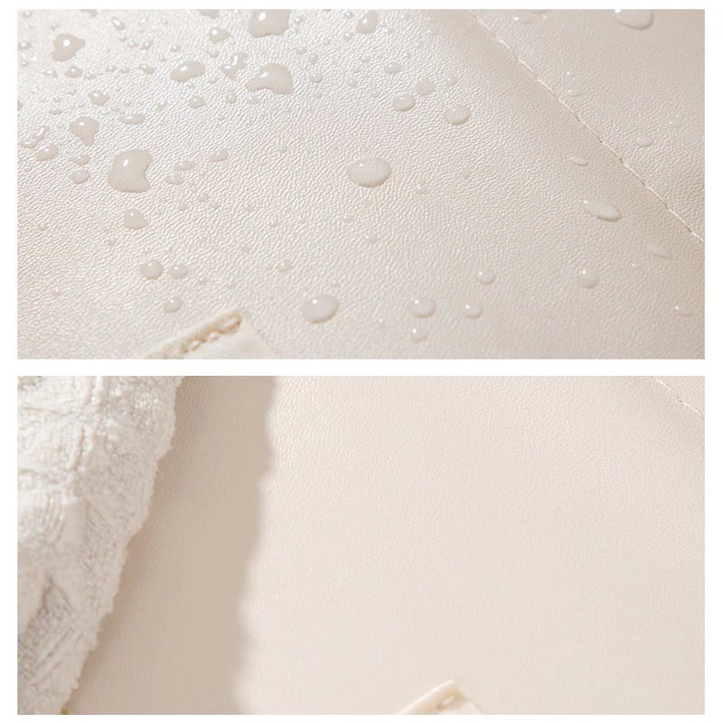 Spill-resistant wipe-clean cosmetic bag with soft-touch finish
