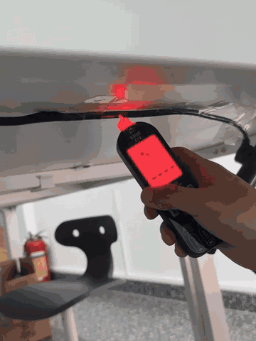 Smart pen multimeter demonstrating non-contact and probe-based electrical checks