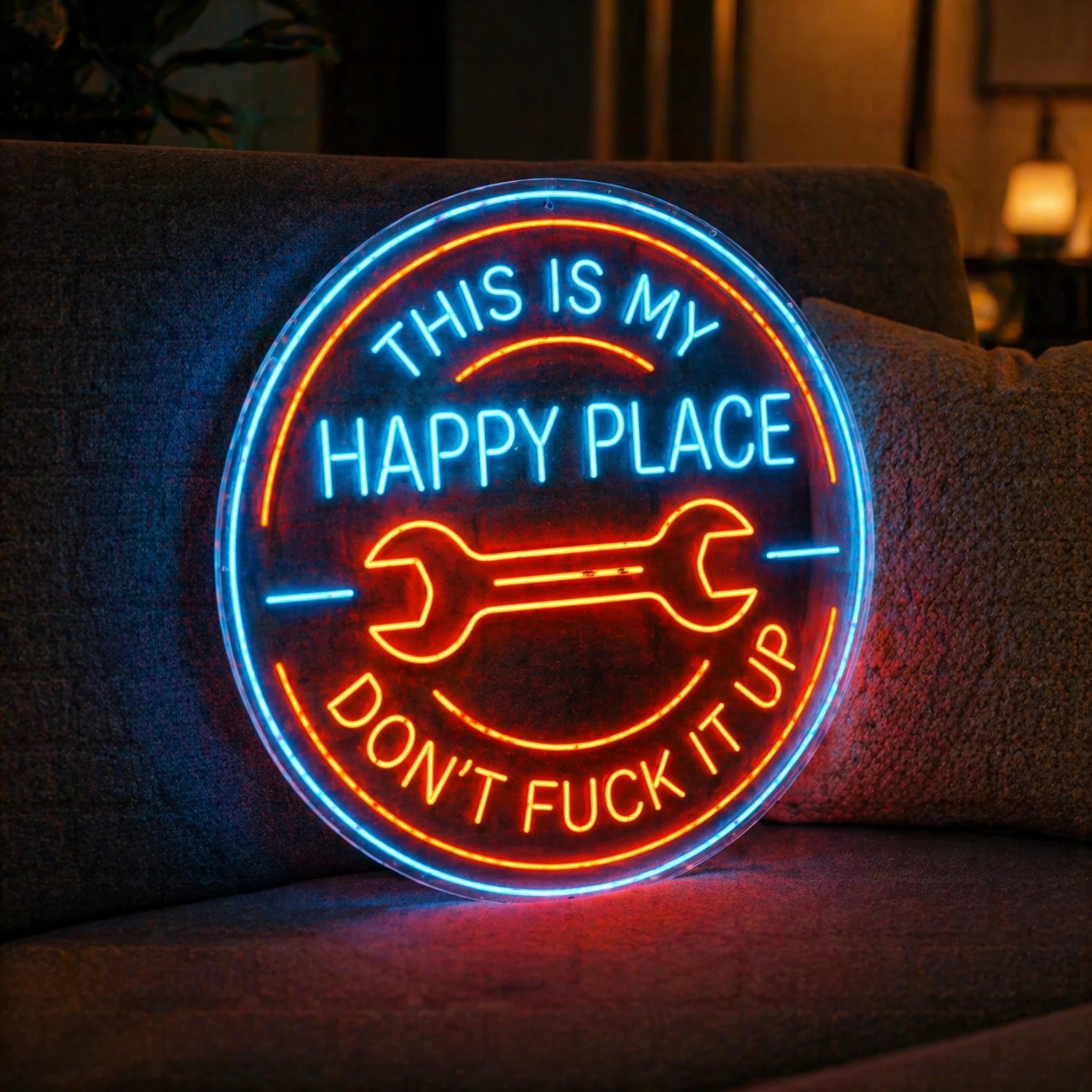 'This Is My Happy Place' LED Neon Sign with Wrench Design lit up in a garage