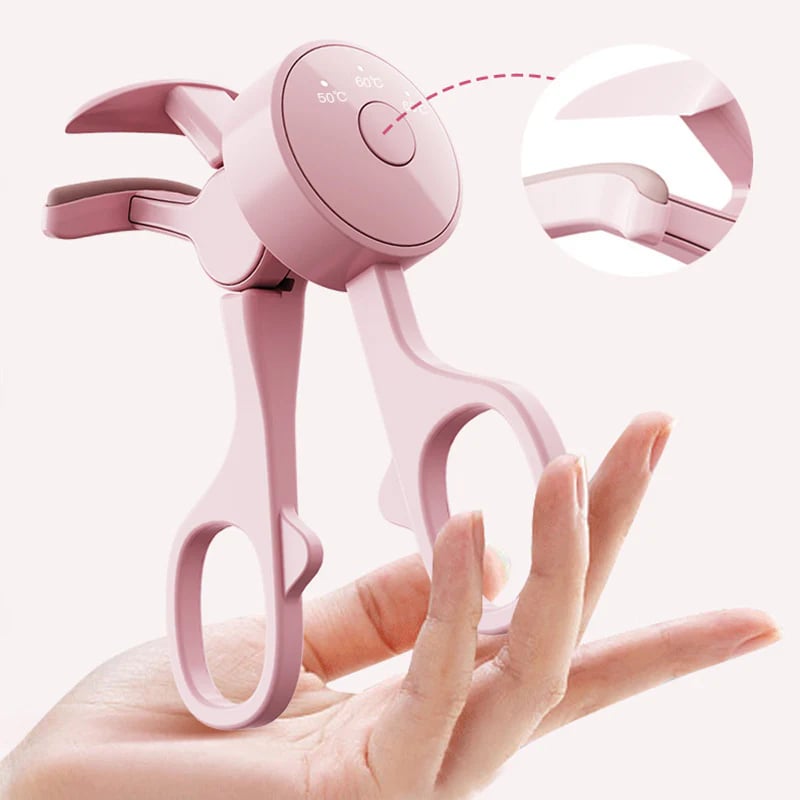 Portable pink heated eyelash curler for makeup bag travel and vanity use