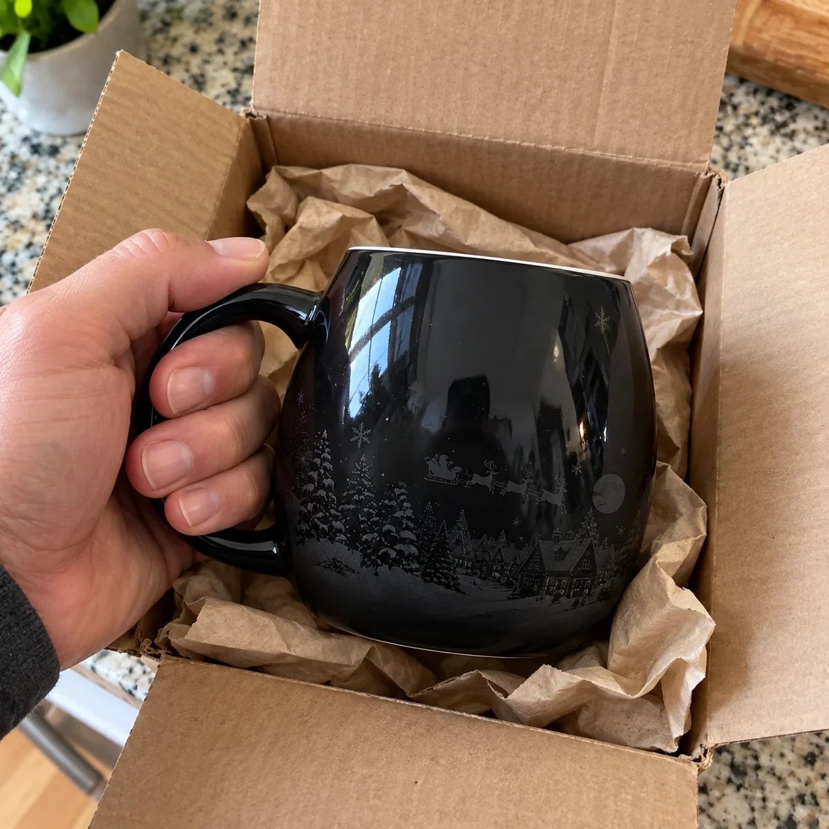 Christmas heat reveal mug in shipping box before hot water is added
