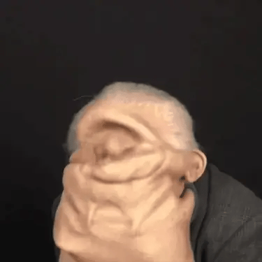 Flexible mask being pulled on over the head