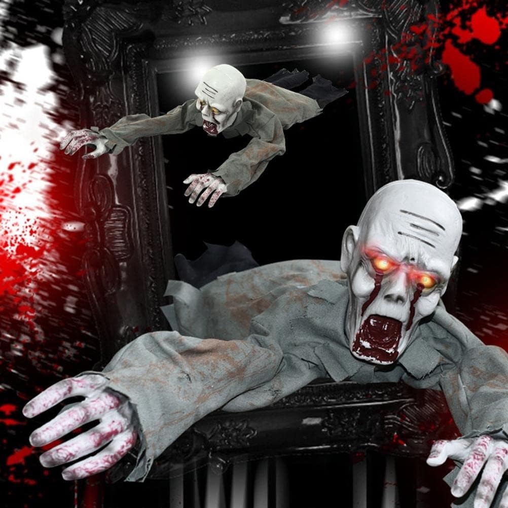 Crawling zombie reaching from a haunted doorway display